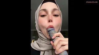 Hijabi sucking a dildo sloppy